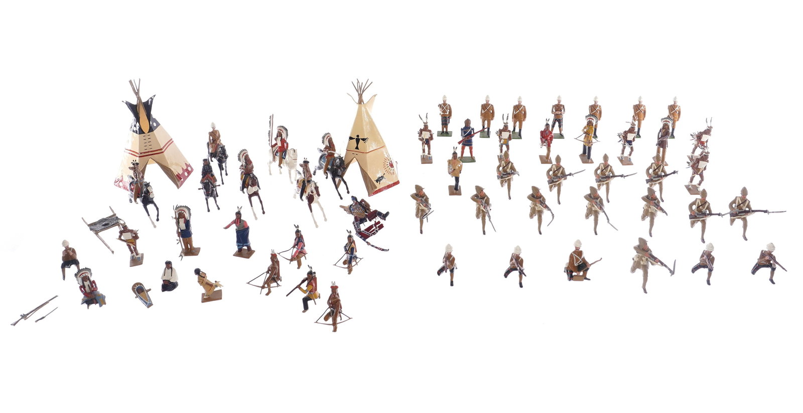 53 pc Hocker Toy Soldiers & Indians Figurines: Approx. 53 piece assembled collection of Hocker metal toy soldiers & Indians figurines. Tallest (wigwam) 6" h. No boxes. Please note we are not experts in toy soldiers, another maker may be discovered