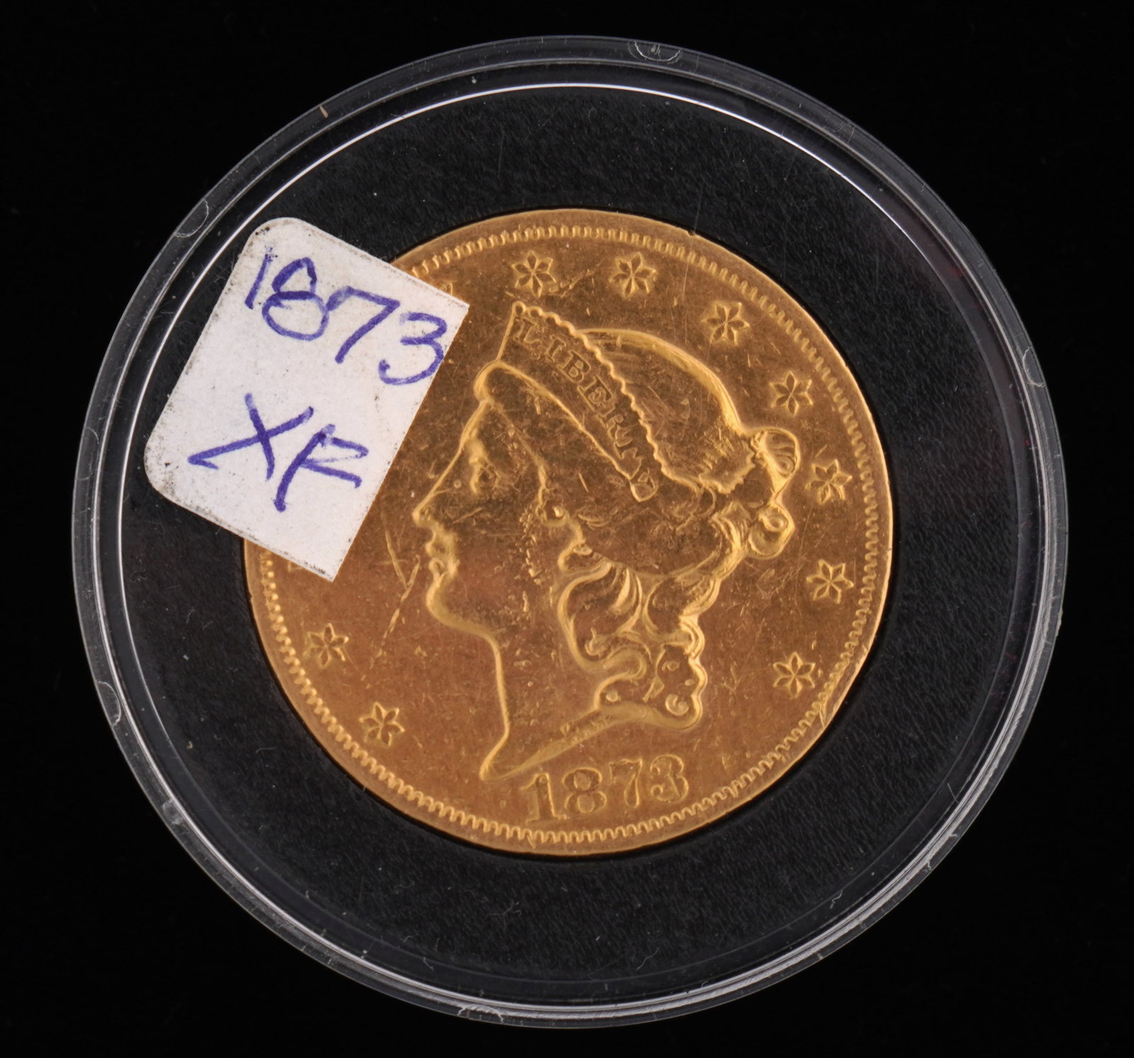 1873 Liberty $20 Gold US Coin XF: 1873 Liberty $20 Gold US coin, graded XF. Grade based on knowledgeable collectors grade written on sleeve, not guaranteed to be correct when professionally graded.
