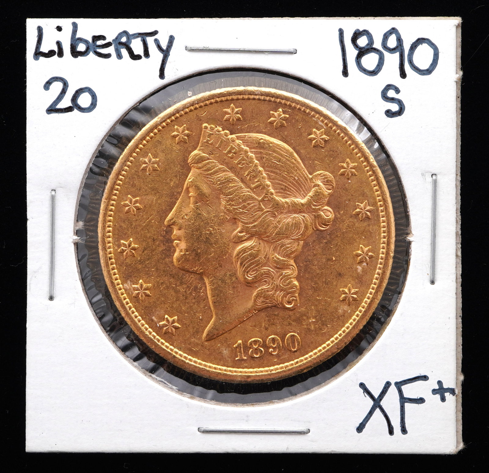 1890-S Liberty $20 Gold US Coin XF+: 1890-S Liberty $20 Gold US coin, graded XF+. Grade based on knowledgeable collectors grade written on sleeve, not guaranteed to be correct when professionally graded.