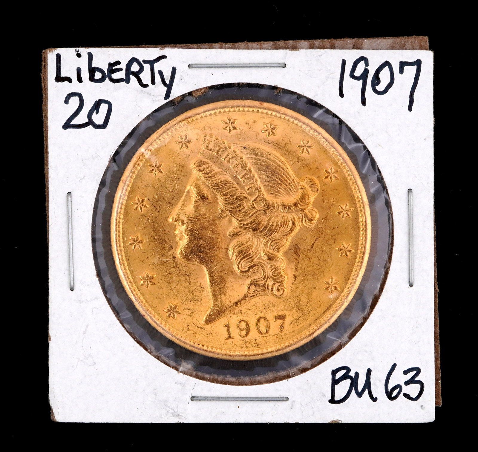 1907 Liberty $20 Gold US Coin BU 63: 1907 Liberty $20 Gold US coin, graded BU63. Grade based on knowledgeable collectors grade written on sleeve, not guaranteed to be correct when professionally graded.