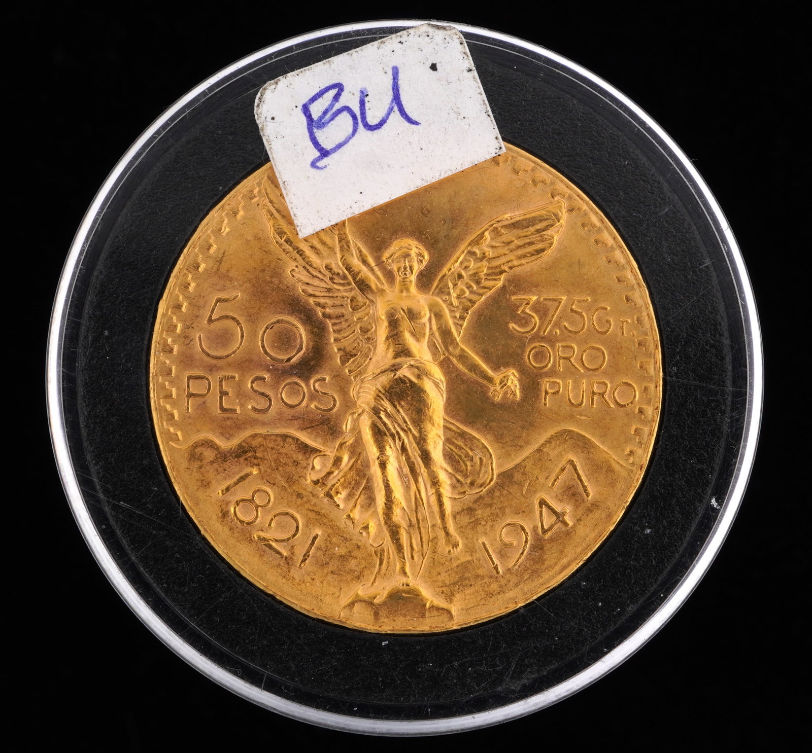 1947 Mexican 50 Peso Gold Coin BU: 1947 Mexican 50 Peso gold coin graded BU. Grade based on knowledgeable collectors grade written on sleeve, not guaranteed to be correct when professionally graded.