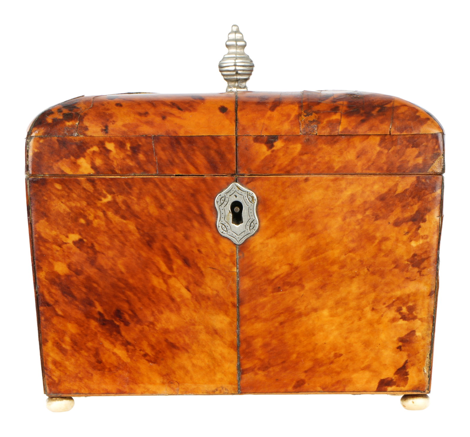 English Regency Tortoise Clad Tea Caddy: 19th Century, Domed hinged lid over tapered body. Clad in tortoise, silver finial. Two lidded compartment interior, non matching bone finials. Bone feet. Overall 6.25" h. x 6.5" x 4". Condition: Crack