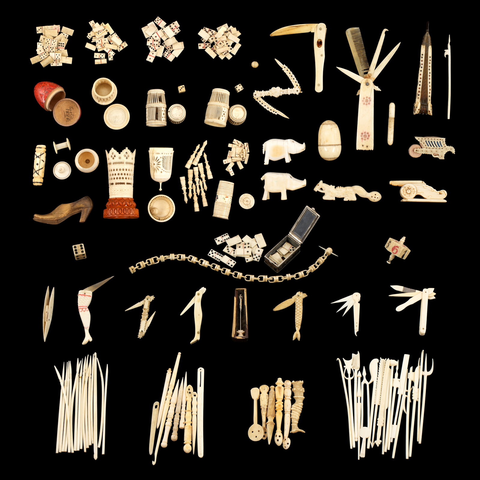Collection 19th C. Sailors Carved Bone Trinkets: An assembled collection of approx. 82 pieces total, 19th Century carved bone, wood, and nut trinkets and assorted items, carved by sailors during down times on board whaling and merchant ships. Trinke