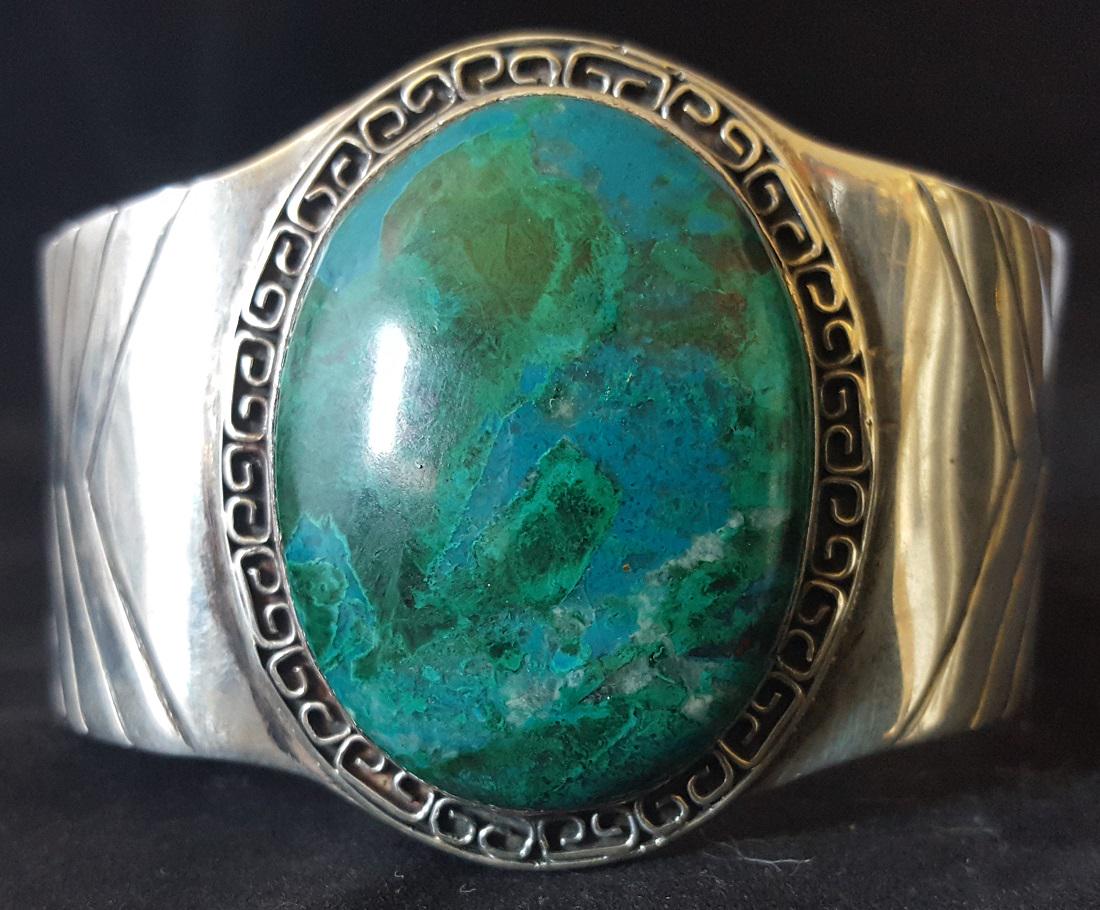 Navajo bracelet: 1970s 80s sterling silver large chrysocolla stone 7" inside diameter 2" wide .75" opening