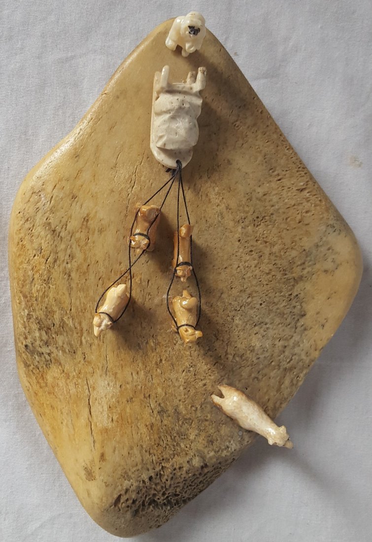eskimo dog sled scene: 1940s 50s hand carved on bone 1.5"x7.5"x5.5"