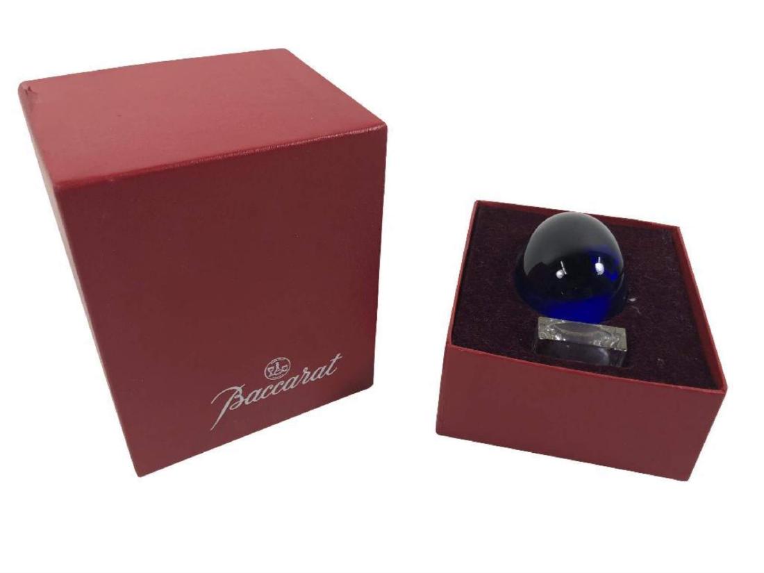 Blue Egg from Baccarat: New in box. Item measures 2.5" in height.