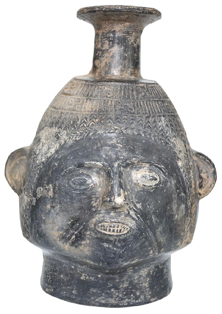 9" H. Incan Headpot. Peru. Excellent condition.: 9" H. Incan Headpot. Peru. Excellent condition. Detailed features including braided hair on back side. Pre-Columbian. Ex-Tom Davis, Dr. John Mountjoy