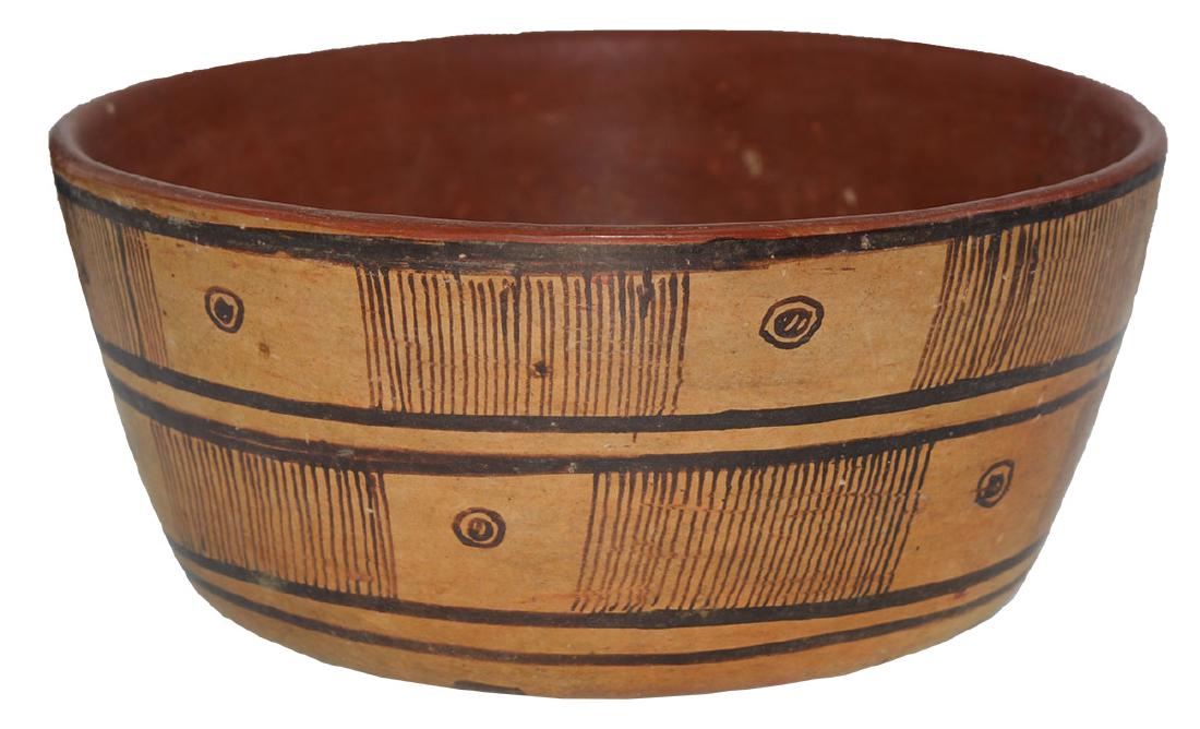 8" D. Nayarit Bowl. MX. Pre-Columbian. Ex-Dr. Earl: 8" D. Nayarit Bowl. MX. Pre-Columbian. 300-800 AD. Redware interior with yellow designs around side. Excellent condition. Ex-Dr. Earl Riddick. Copy of Frederick Dockstader's 1986 appraisal ($750) incl