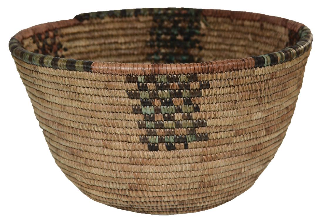 11 1/4" D. Coil Basket. 1950's. Noted as "Jicarilla: 11 1/4" D. Coil Basket. Sold at the Dr. Warren Baker Sale over 30 years ago. 1950's type. Native American. Noted as "Apache"