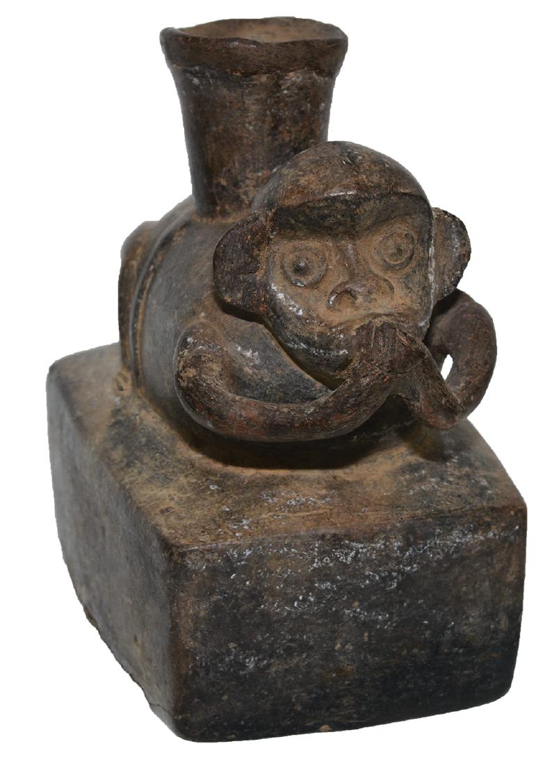 5 5/8" D. Monkey Effigy Bowl. Peru. Very old example: 5 5/8" D. Monkey Effigy Bowl. Peru. Pre-Columbian. Finely made, slick finish. Pressure cracking and minor repair (ear, rim). Very old example