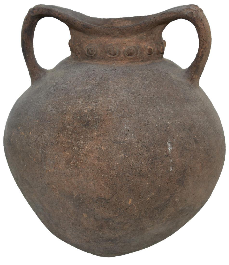 5 1/2" H. Suspension Pot . Peru. Ex-Dale Roberts: 5 1/2" H. Suspension Pot with conical bottom. Double handles and decorated neck. Peru. Pre-Columbian. Solid. Ex-Dale Roberts Collection