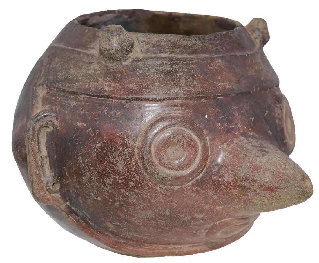 8" D. Headpot. Pre-Columbian, MX.: 8" D. Headpot (5 1/2" H.). MX. Toltec. Pre-Columbian, MX. Highly detailed with two section near rim glued with minimal filler. Excellent dark brown paint. Long nose and circular eyes. Ex-Lawrence Bish