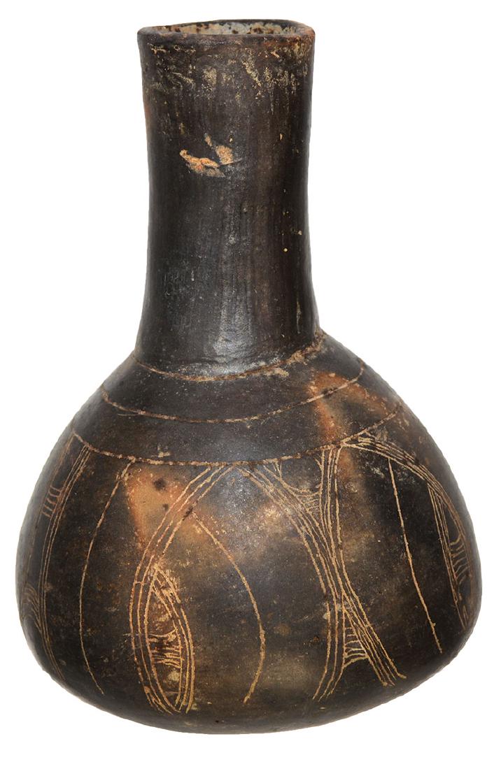 6 1/8" H. Caddo Haley Engraved Bottle. Hempstead Co,: 6 1/8" H. Caddo Haley Engraved Bottle. Hempstead Co, AR. Very fine example with artistic engraving and fine finish. Small hole repair, otherwise appears solid. Very fine. Ex-Jack Bonds