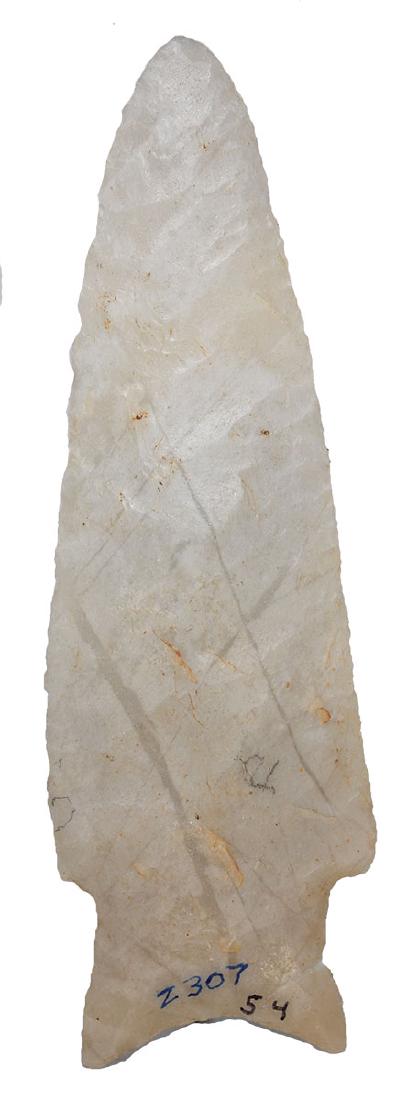 4 7/8" Jakie Stemmed Point. Translucent. Pic Legends II: 4 7/8" Jakie Stemmed Point. Pope Co, AR. G10 example made of translucent Novaculite. Thin, very well flaked. Pictured in Legends of Prehistoric Art II (p331). Ex-Tom Davis, Randy Hudson, Lorenzo Badge