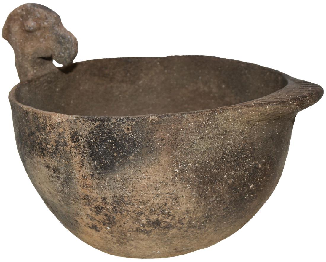 9" D. Wood Duck Effigy Bowl. Lawrence Co, AR. Fine: 9" D. Wood Duck Effigy Bowl. Lawrence Co, AR. Very good condition with original head (may be reattached). No evident bowl repair. Fine old example once in the Kevin Pipes Collection