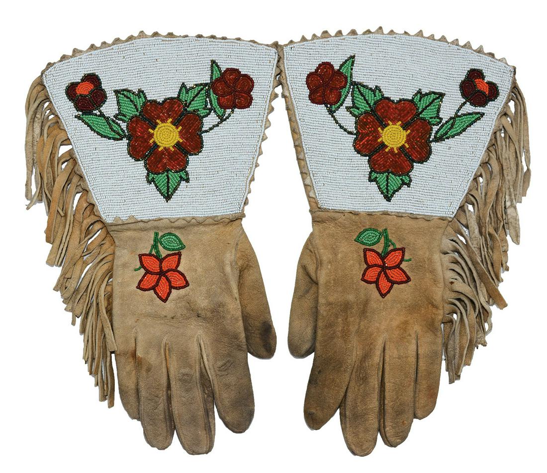 Pair of Beaded Gauntlet Gloves (13") . 1950's. Floral: Pair of Beaded Gauntlet Gloves (13") . 1950's. Floral Beadwork in excellent condition. Leather supple and in good condition. Native American