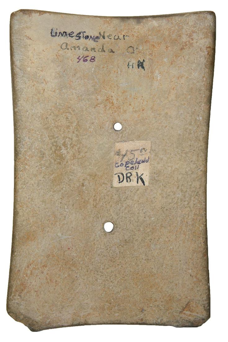 4 5/8" Quadraconcave Gorget. Featured in Copeland: 4 5/8" Quadraconcave Gorget. Amanda, OH (Fairfield Co.). Rare Limestone example with good history. Heavy deposits on back side. Ex-Gilbert Cooper, Dr. Stan Copeland, Dr. T. Hugh Young, Dr. Leon Kramer