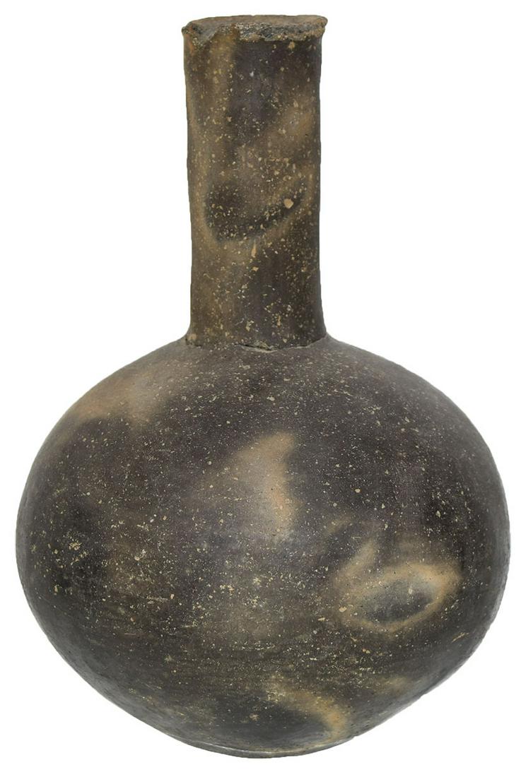 9 1/2" H. Caddo Bottle. AR. Tall neck, good balance.: 9 1/2" H. Caddo Bottle. AR. Tall neck, good balance. Body has slight pressure cracks, but rings solid. Neck reattached. Ex-Larry Swann