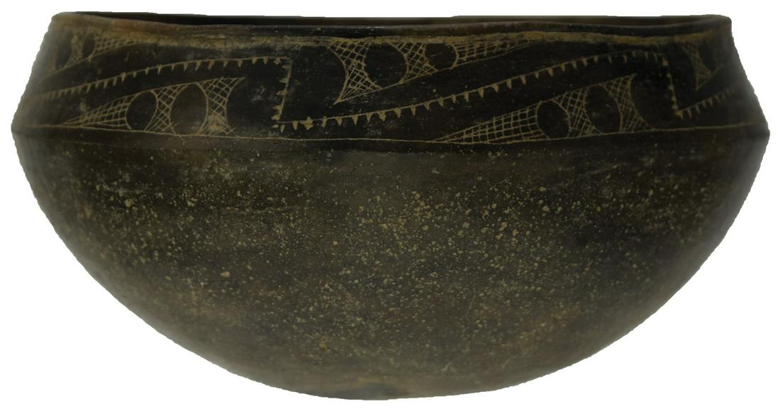 6 5/8" D. Engraved Caddo Bowl. Clark Co, AR.: 6 5/8" D. Engraved Caddo Bowl. Clark Co, AR. Carinated rim with artistic engraving. Fine condition with section of rim glued. Ex-Ken Partain