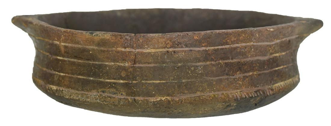 7 1/2" D. Canoe Effigy Bowl (East Incised). Miller Co,: 7 1/2" D. Canoe Effigy Bowl (East Incised). Miller Co, AR. Engraved bowl. Some minor repair and light pressure cracking. Graceful example. Ex-Kevin Pipes