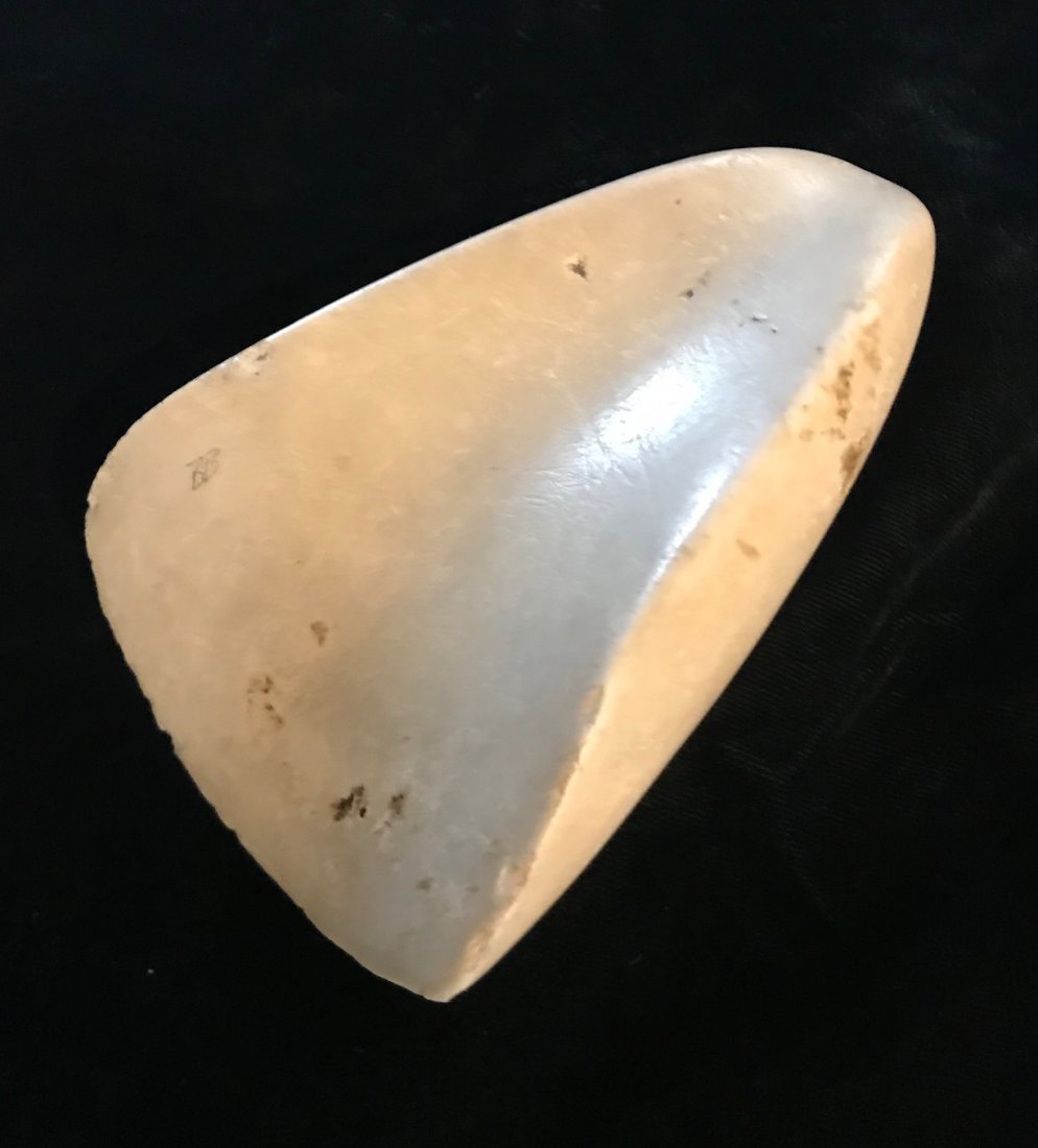 4 1/2" Tridacna Clam Shell Gouge. Micronesia. Carved: 4 1/2" Tridacna Clam Shell Gouge. Micronesia. A work of art, carved from a large Tridacna Clam Shell. Very old example. G10, excellent symmetry. Deeply "scooped" bit. Finely polished. Ex-Robert Bourde