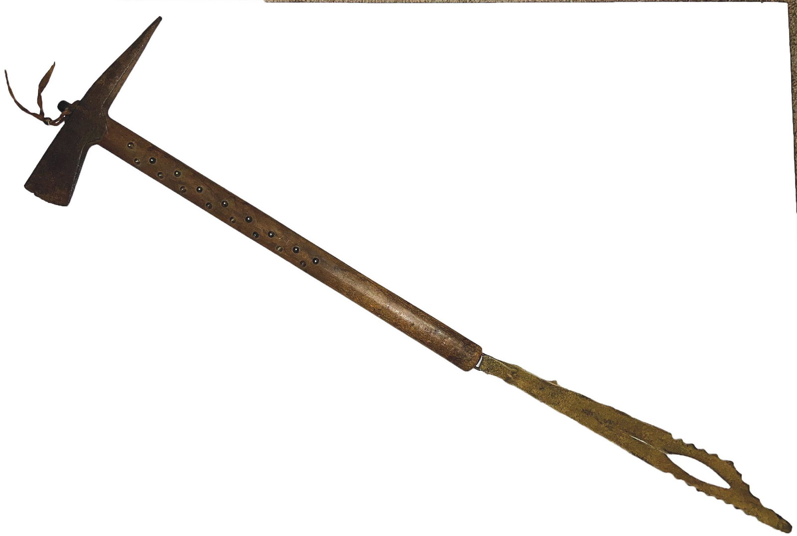 18" Tomahawk with pick style pole.  Decorated with leather drops on both ends.  Very old (1 of 8)