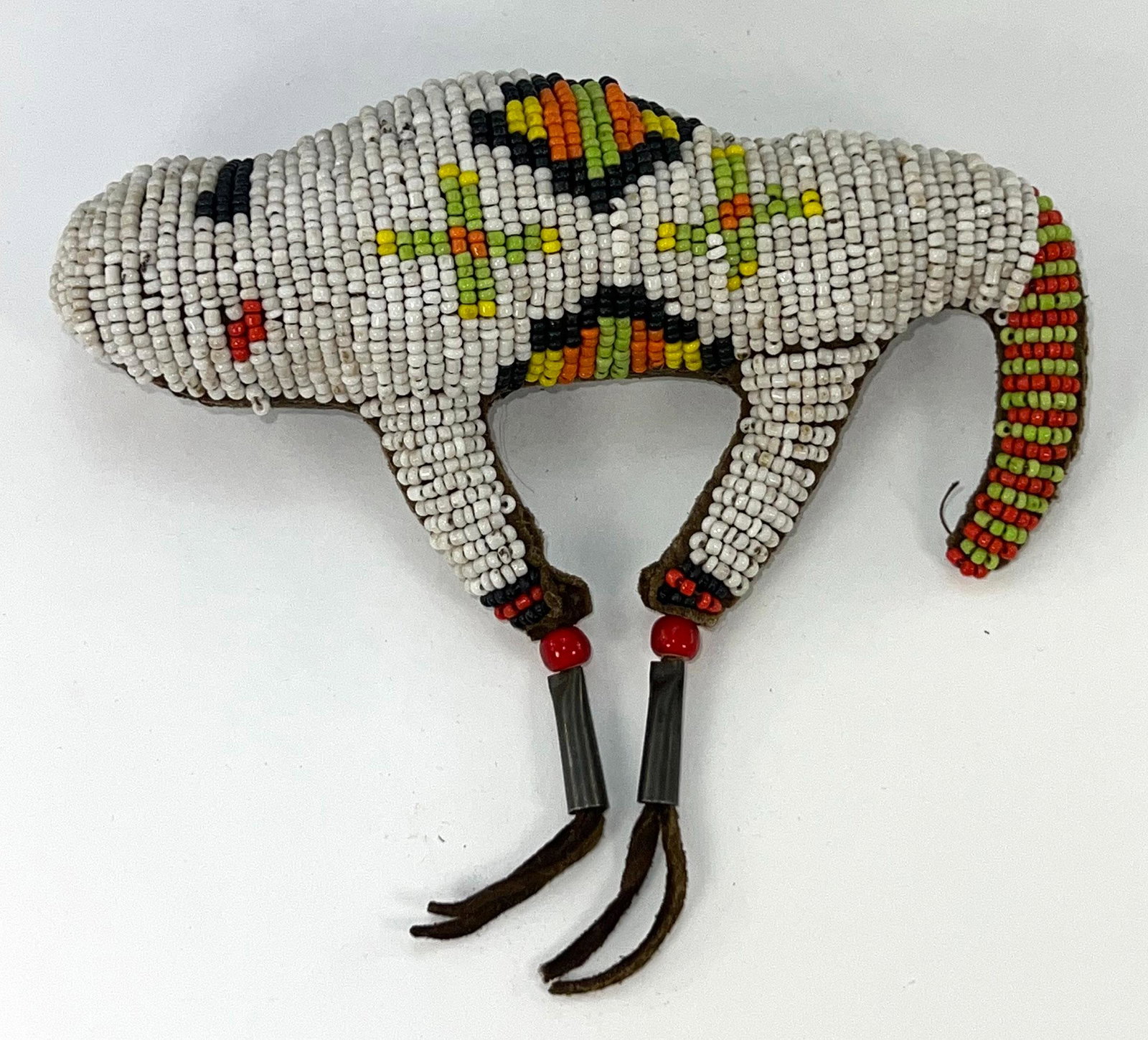 2 Native American Fetishes. 5" Turtle and 5 1/2" Buffalo. Fully beaded: 2 Native American Fetishes. 5" Turtle and 5 1/2" Buffalo. Fully beaded tops and leather backs. Colorful seed beads, little if any bead loss. Nice examples acquired in the 1950's (tourist trade). Nativ