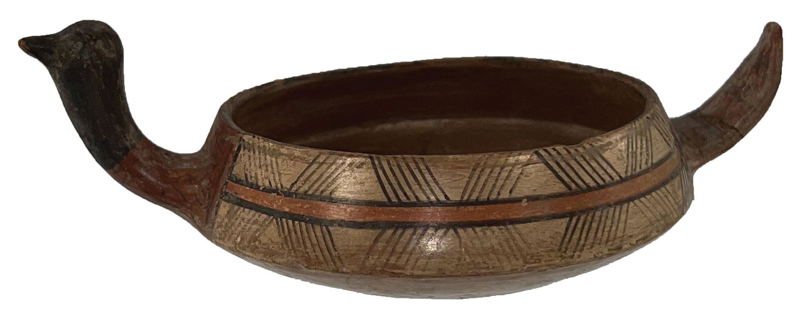 5 7/8" D. Inca Polychrome Effigy Bowl. Paccha (bird form). Peru. Incan: 5 7/8" D. Inca Polychrome Effigy Bowl. Paccha (bird form). North coast of Peru. Incan, 1300 to 1500 AD. Artistic form with detailed original paint. Solid bowl. Tail has been repaired with no restorati