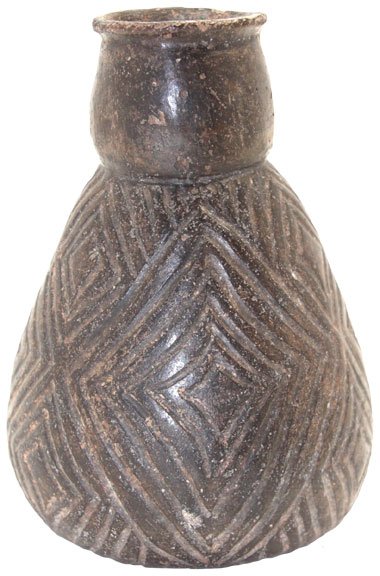 4 7/16” Heavily Engraved Caddo Bottle. Ex-Pipes: 4 7/16” Heavily Engraved Caddo Bottle. Red River, TX. Ex-Pipes, Ashley. Solid. Pic in Art of Ancient Caddo, pg 211