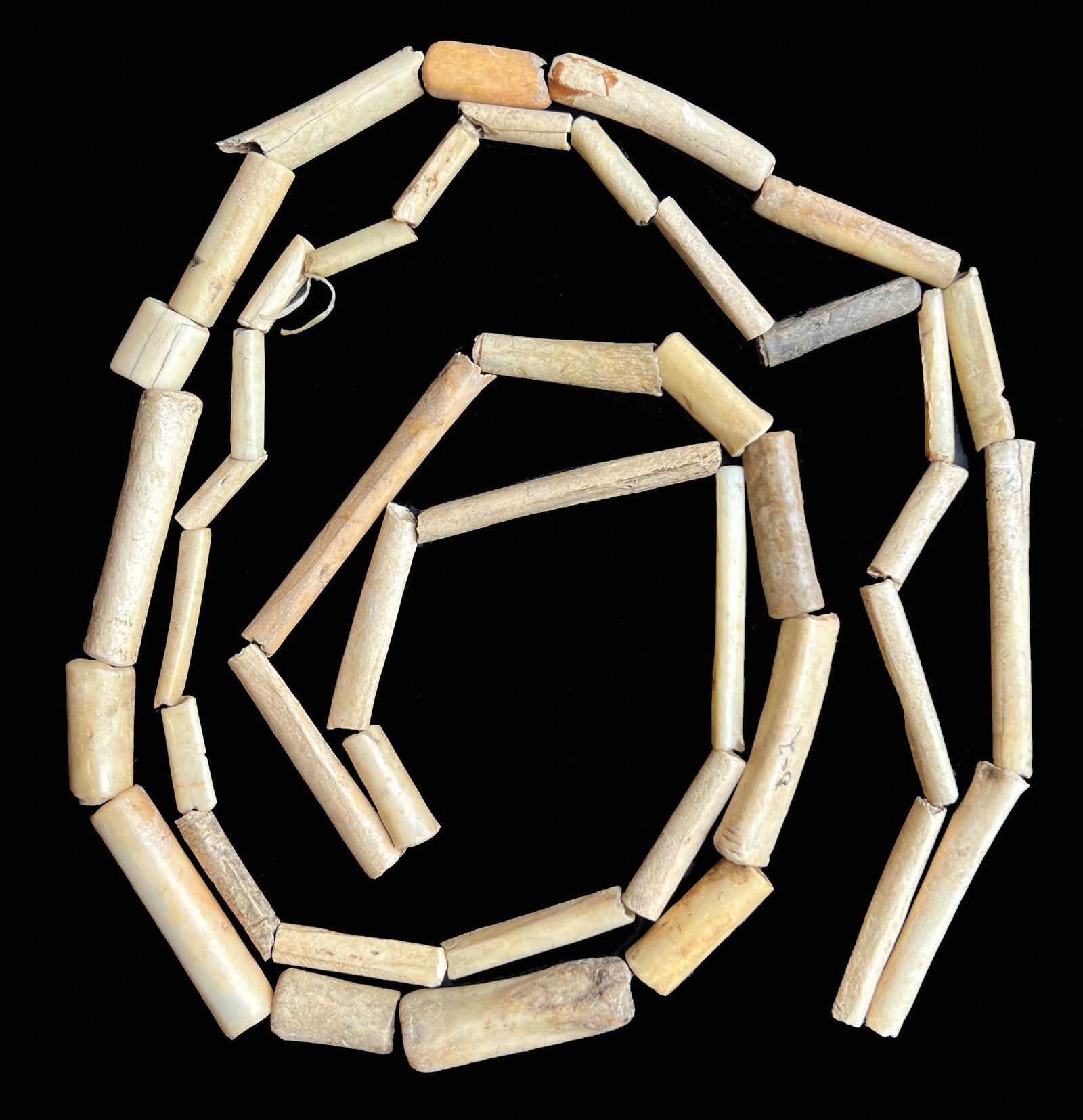 48" Animal Bone Necklace. Carved beads measure in the 1 3/4" Range. TN. Ex-Kevin Pipes: 48" Animal Bone Necklace. Carved beads measure in the 1 3/4" Range. Eastern TN. Ex-Kevin Pipes