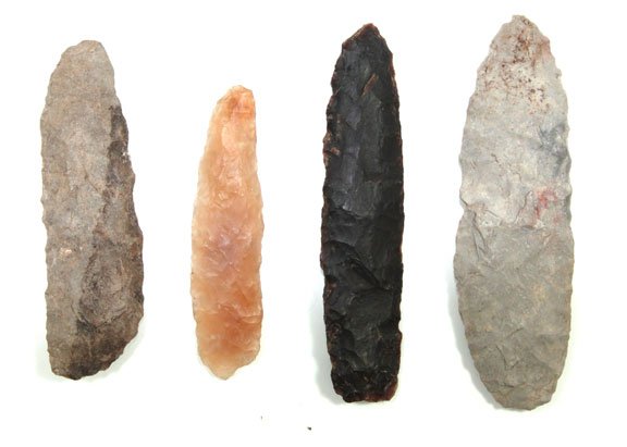 Four Side Knives. Morton Co, ND. Rogers Papers: Four Side Knives. Found as a cache in Morton Co, ND. One is made of Knife River, one of a translucent Agate and two made of a Gray Chert. Longest is 3 3/8”. Each has a Rogers and Partain Paper