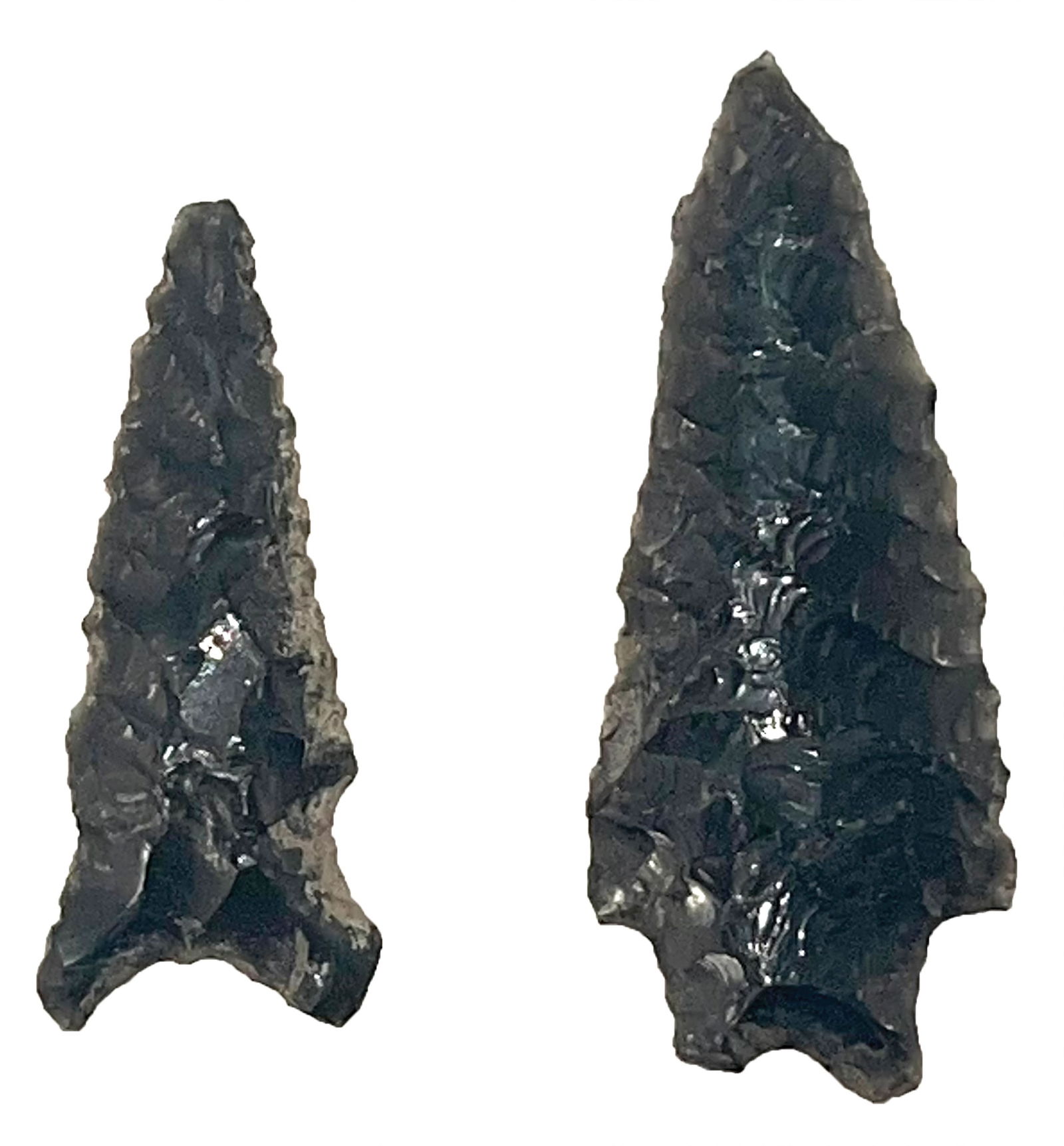2 Hanna Points. Made of Obsidian. Wyoming. Ex Terry Allen. Motley COA.: 2 Hanna Points (1 11/16" and 2 1/8"). Made of Obsidian. Resharpened during ancient times. Wyoming. Ex Terry Allen. Motley COA.