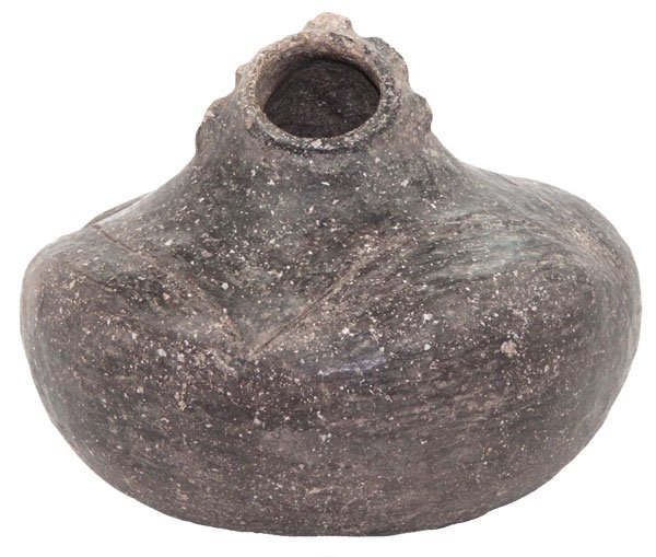 Early Corngod Effigy Bottle. AR. Ex-Dan Stroud: 421. 7” Early Corngod Effigy Bottle. AR. Appears solid . Loaded with shell temper and with glossy finish. Ex-Stroud