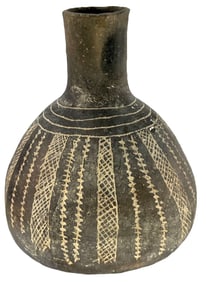 7 1/4" T. Caddo Engraved Friendship Bottle. Arkansas. Minor repair. Ex Daniel Wolf.