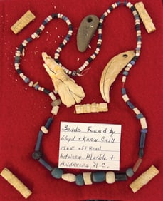 Frame of beads recovered by Lloyd and Karin Cash in 1965. North Carolina.