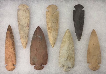 Frame of 7 Dovetails for display. Nice example. 3 11//16” to 4 9/16”. Ex Wally Zollman.