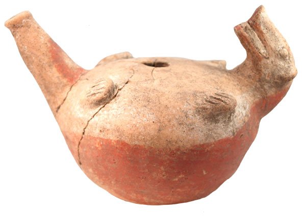 Quapaw Swimming Otter Effigy Bottle. Strange: 274. 7 1/2” Quapaw Swimming Otter Effigy Bottle. Fine example with some gluing, no restoration. A fine addition to any pottery collection. Ex-Kent Strange