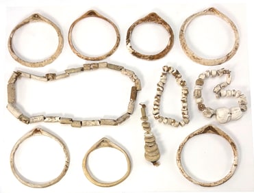 Frame of 11 Shell Bracelets, Pendants and Beads. Oregon. T. Davis COA's.
