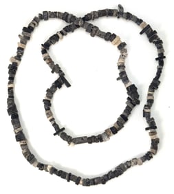34" Strand of stone beads. Oregon in the 1930s. Pictured. Ex King Ross Collections. 
