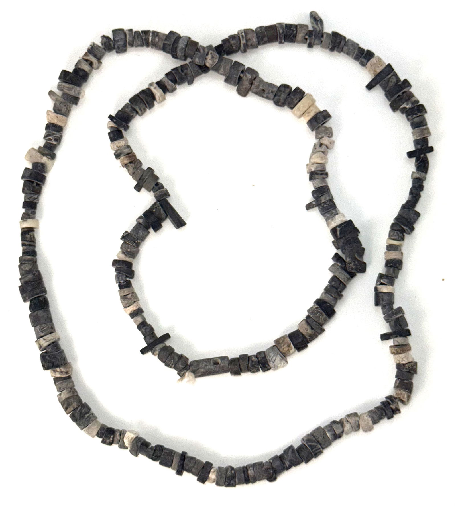 34" Strand of stone beads. Oregon in the 1930s. Pictured. Ex King Ross Collections.  (1 of 1)
