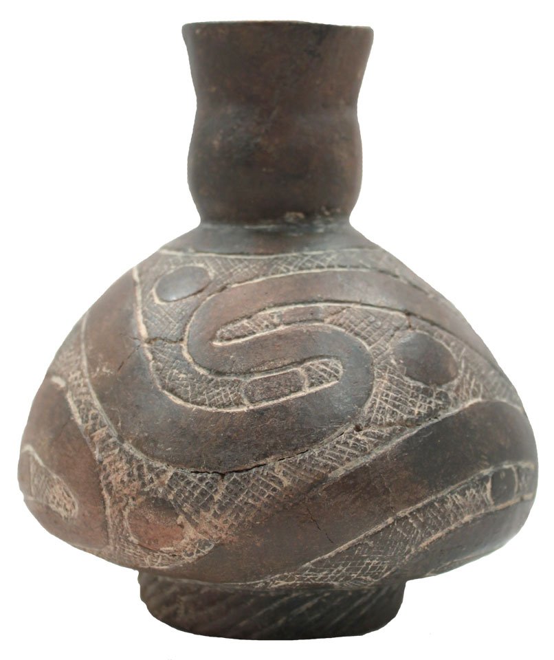 5 1/2" H. Hodges Engraved Caddo Bottle. Well pictured: 5 1/2" H. Hodges Engraved Caddo Bottle. AR. Ex-Joe Kinker, Chuck Adams. Very fine condition with minor repair. Well pictured in Feb 2012 Prehistoric Antiquities, pg 26. Partain COA