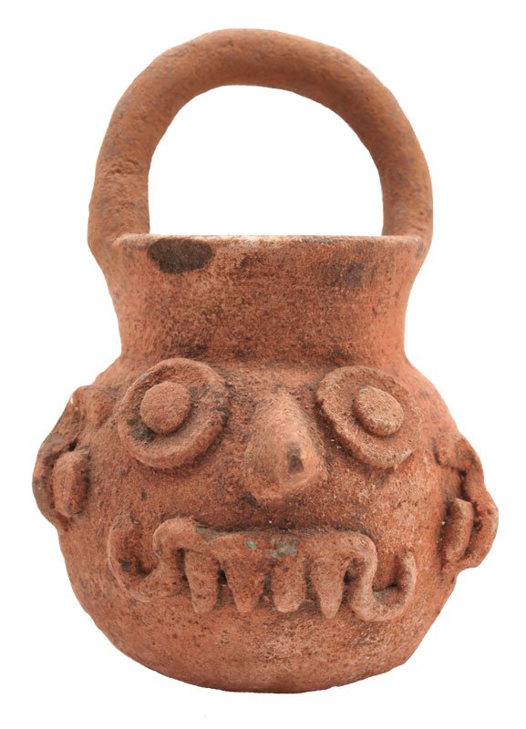 4 3/4" zh. Globular orangeware bowl with strap handle;: 4 3/4" zh. Globular orangeware bowl with strap handle; Tlaloc design applique on side. Toltec; Hidalgo. 1986 Dockstader Appraisal. PreColumbian