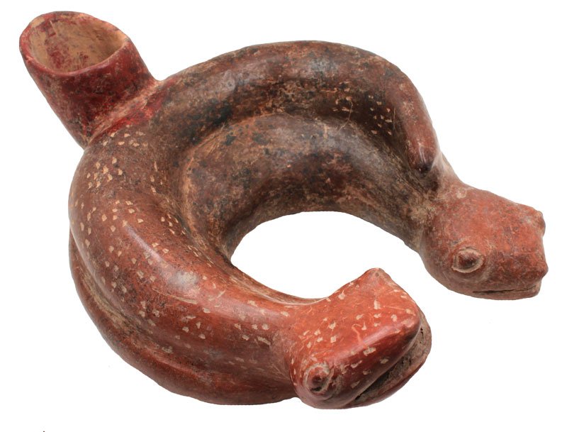 8 1/4" Modeled double-headed serpent. Pecked brown: 8 1/4" Modeled double-headed serpent. Pecked brown surface; head's turned up, mouth open. Perhaps a mating scene. Short spout in rear center. Colima. MX. 250 BC to 250 AD. 1986 Dockstader Appraisal. E