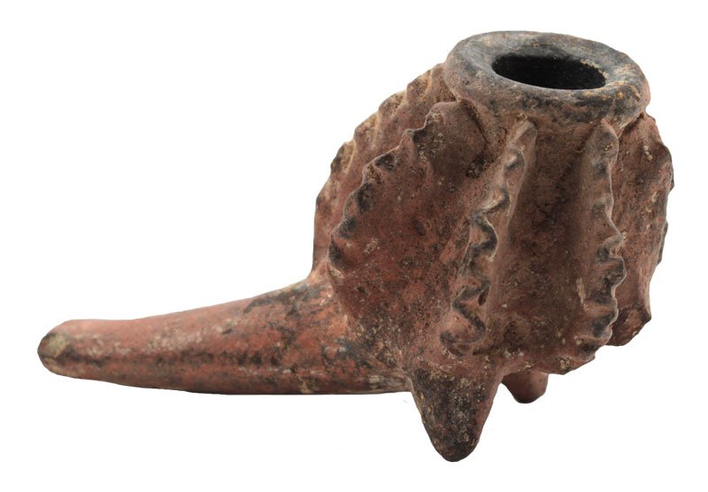 3 1/2" L. Fine modeled redware pipe; eight vertical: 3 1/2" L. Fine modeled redware pipe; eight vertical serrated vanes around globular body. Short tapered conical stem. Broken and repaired. Colima. MX. 250 BC to 250 AD. 1986 Dockstader Appraisal. PreCo