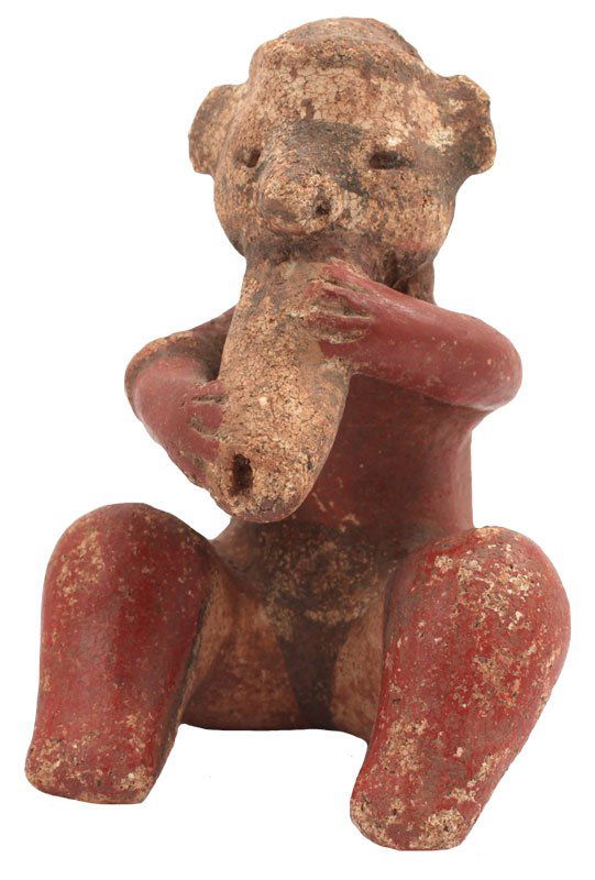 4 1/4" modeled seated Flute Player. Solid redware body,: 4 1/4" modeled seated Flute Player. Solid redware body, black head with white paint. Nayarit. MX. 100 BC to 500 AD. 1986 Dockstader Appraisal. PreColumbian