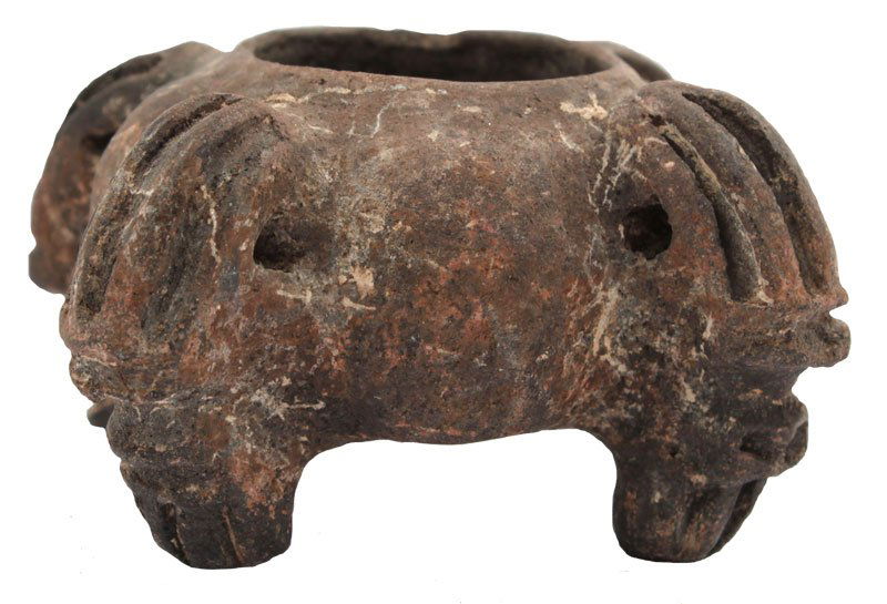 3 1/4" Blackware 9 (possibly stone) bowl; quartered: 3 1/4" Blackware 9 (possibly stone) bowl; quartered projections. Unpainted. Michoacan. 1986 Dockstader Appraisal. PreColumbian