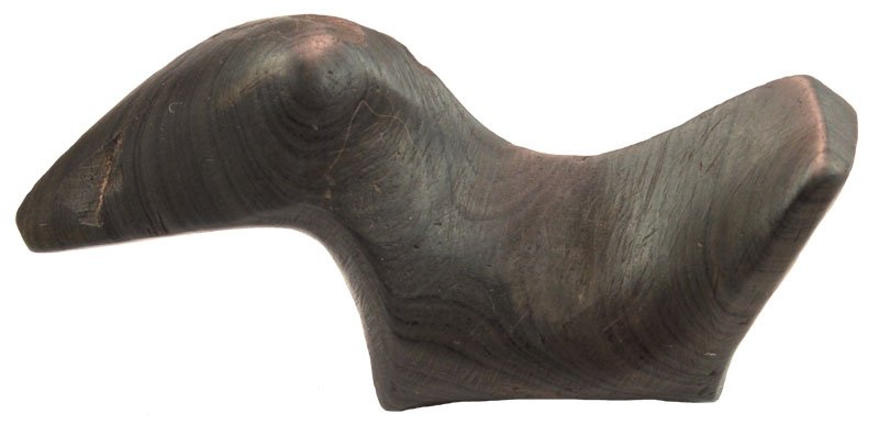 3 1/4" Slate Birdstone. Pictured in Parks' March 1983: 3 1/4" Slate Birdstone. Erie Co, OH. T-5191. Ex-Cameron Parks, Dr. T. Hugh Young (Young tag #477). Front hole broken out. Highly developed example. Pictured in Cameron Parks' March 1983 Sale Catalog.