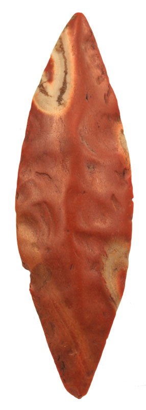 4 3/8" Polished Bi-Point Blade. Cole Co., MO. Ex-Ed: 4 3/8" Polished Bi-Point Blade. Cole Co., MO. Ex-Dr. McGuire, Ex-Ed Buel (#986). Earl acquired in 1952. Lots of color on this rare flint relic