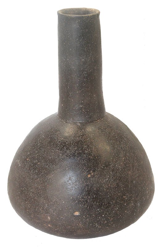 8 3/4" H. Caddo Polished Blackware Bottle. Pictured: 8 3/4" H. Caddo Polished Blackware Bottle. Clark Co, AR. Excellent symmetry, fine finish. Pictured in Art of the Ancient Caddo (p235). Sam Johnson