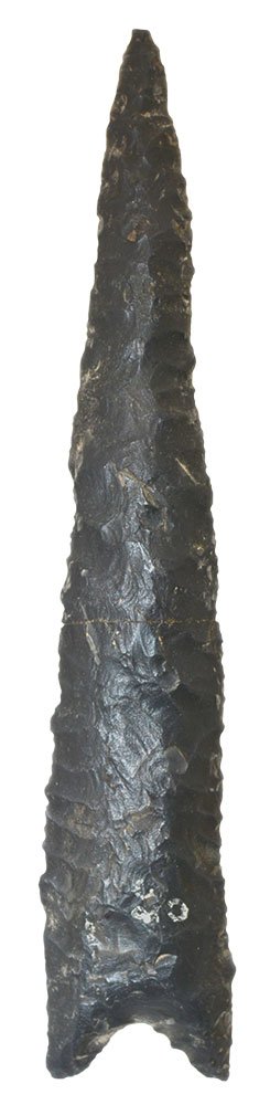 5 1/2" Dalton. AR. Some lateral bow. Quartzite: 5 1/2" Dalton. AR. Well made with some lateral bow. Black Quartzite (Quachita). Ex-Bryce Hathcock. Putty G8+ COA